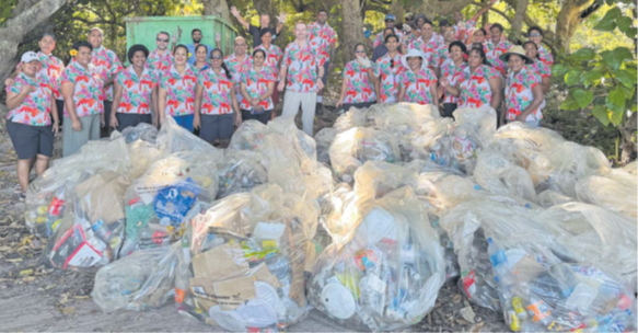 Management and colleagues from InterContinental Fiji Golf Resort & Spa act as custodians of Natadola Beach during a large-scale clean-up. Picture: SUPPLIED