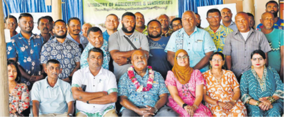 Assistant Minister in the Prime Minister’s Office Sakiusa Tubuna (with garland) with New Valley executives, government officials and farmers at an information session in Sabeto on Thursday. Picture REPEKA NASIKO