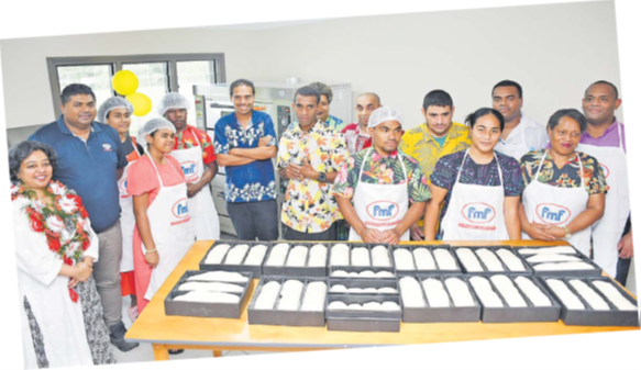 Minister for Women, Children and Social Protection Sashi Kiran (left) with FMF Foods Ltd representatives and the National Council for Person with Disability Centre–Lautoka vocational students during the handover of the Welfare Graduation Program (WGP) project materials. Picture: REINAL CHAND